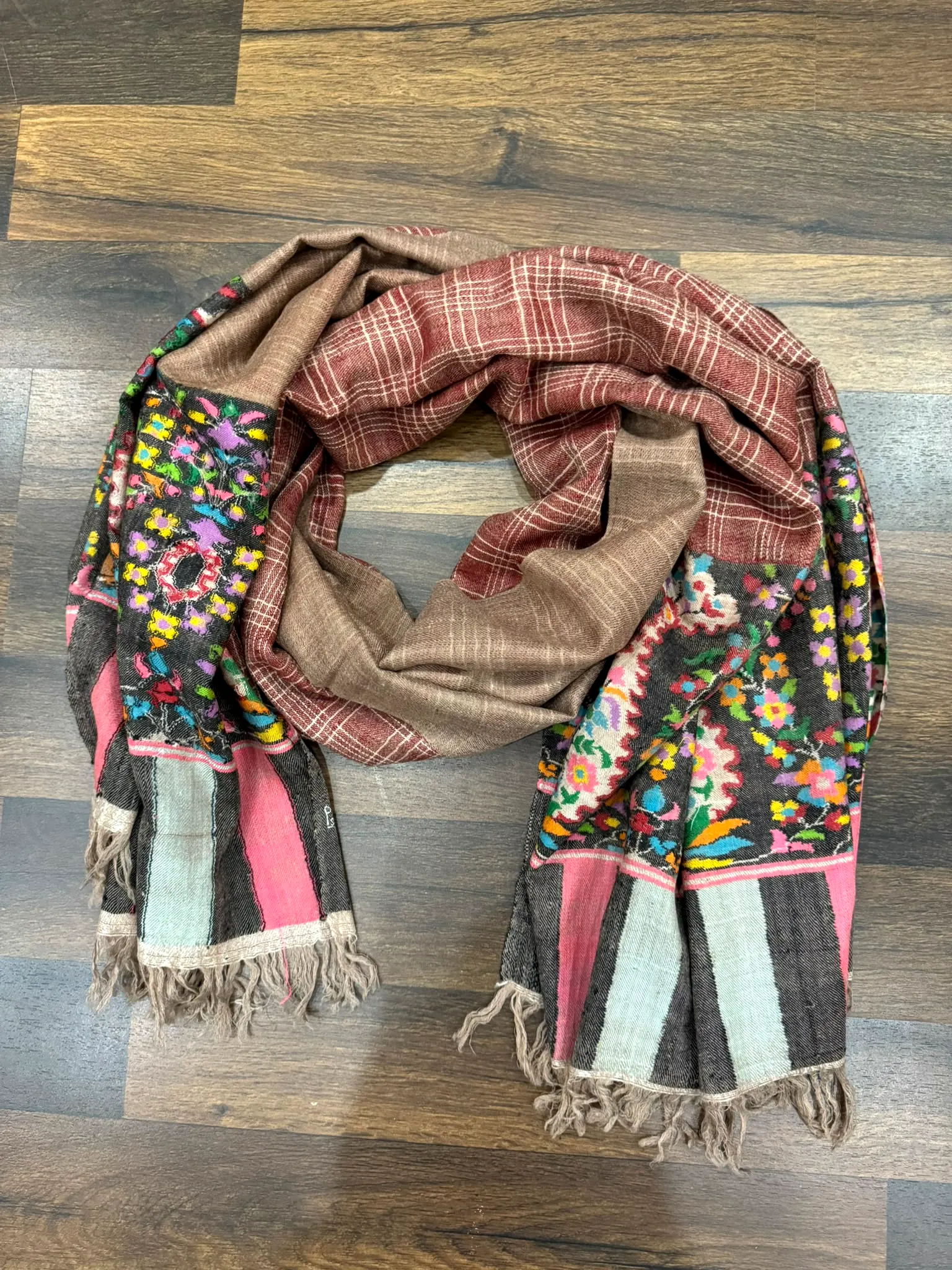 Kani stole combining a plum check, a floral panel and pink, grey and black striped ends.