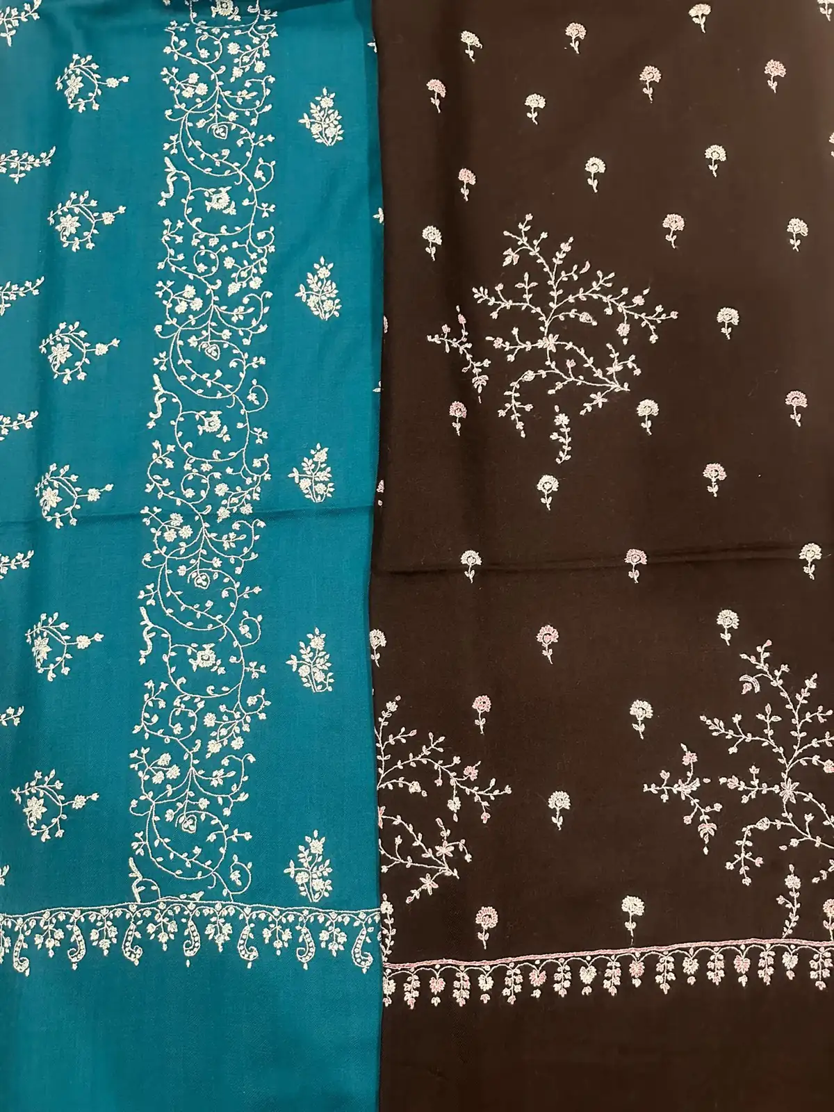 Teal and chocolate brown stoles with fine white sozni sprigs and borders.